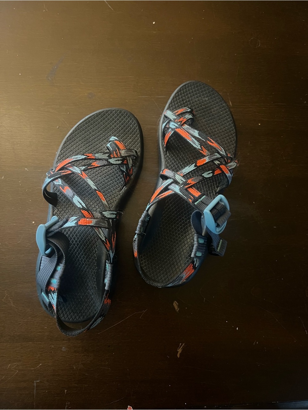 Women’s blue and red Chaco sandles